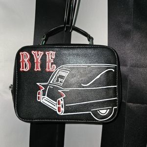 Hearse purse. Not sure what brand, 2 zipper black with strap.